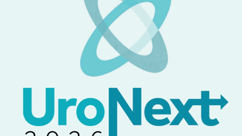  Logotipo do evento UroNext 2026, com um símbolo abstrato em tons de azul sobre o nome “UroNext" e o ano “2026" abaixo.