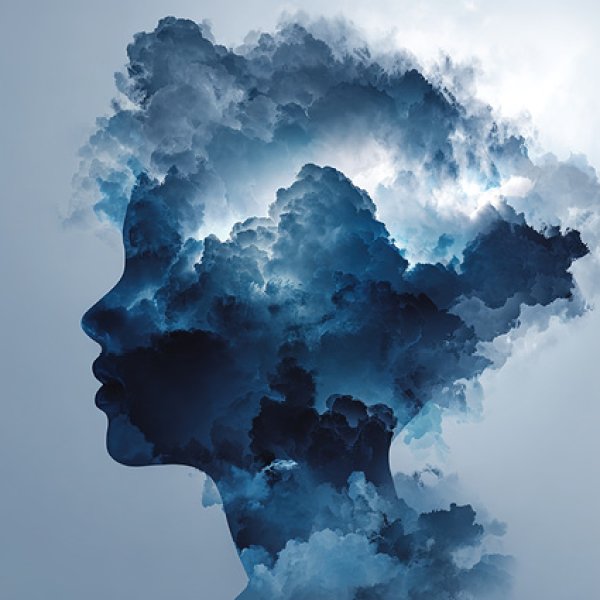 Imagem de cara formada por nuvens escuras.